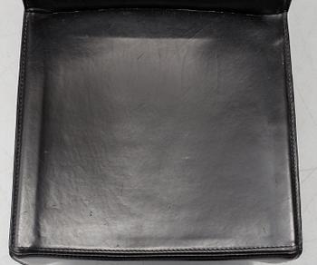 A Philippe Starck 'J Serie Lang' black leather and cast aluminium lounge chair, by Aleph, Italy.