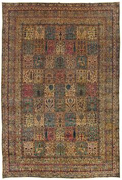 A CARPET. An old Kerman. 521 x 356 cm.