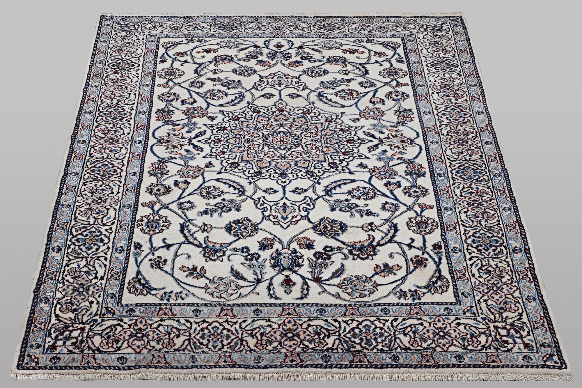 A carpet, Nain, part silk, 9 laa, ca 290 x 196 cm.