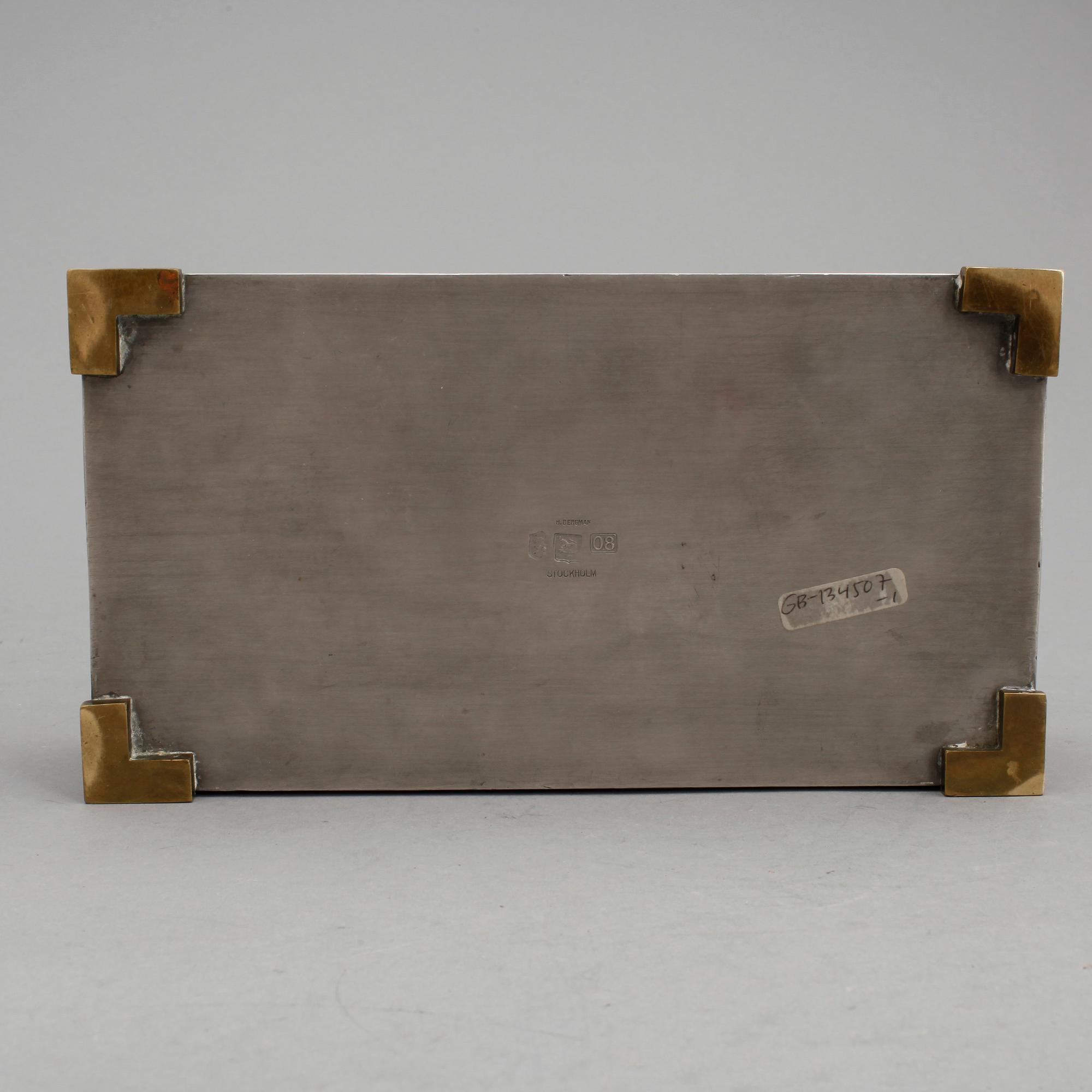 SKRIN, tenn och mässing, Herman Bergmans Konstgjuteri, Stockholm, 1940.