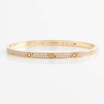 Cartier, "Love" bracelet, small model in 18K gold with brilliant-cut diamonds.