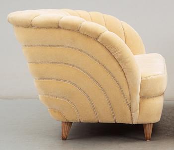 A Swedish off-white velvet plush three seated sofa, 1930-40's.