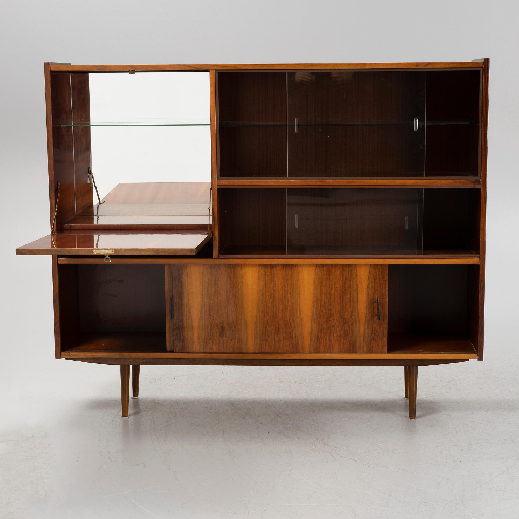 A walnut veneered cabinet, 1950's/60's.