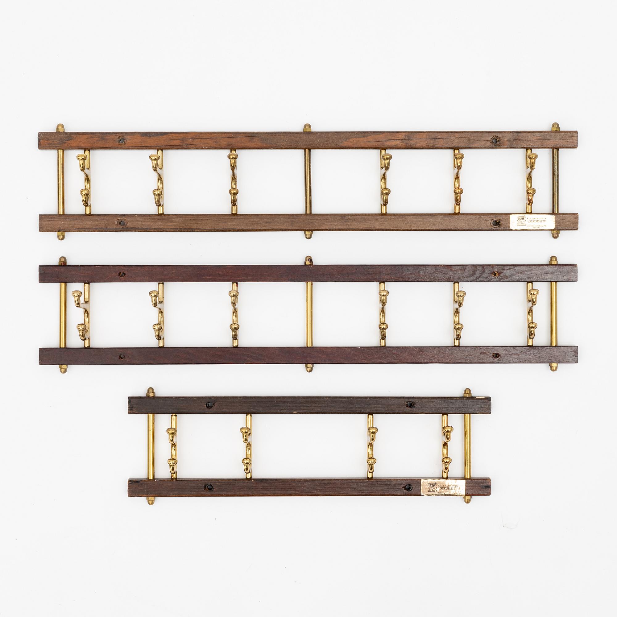 A set of three 'Dekorativ' coat hangers, Skoglunds metallgjuteri, Anderstorp, 1950's/60's.