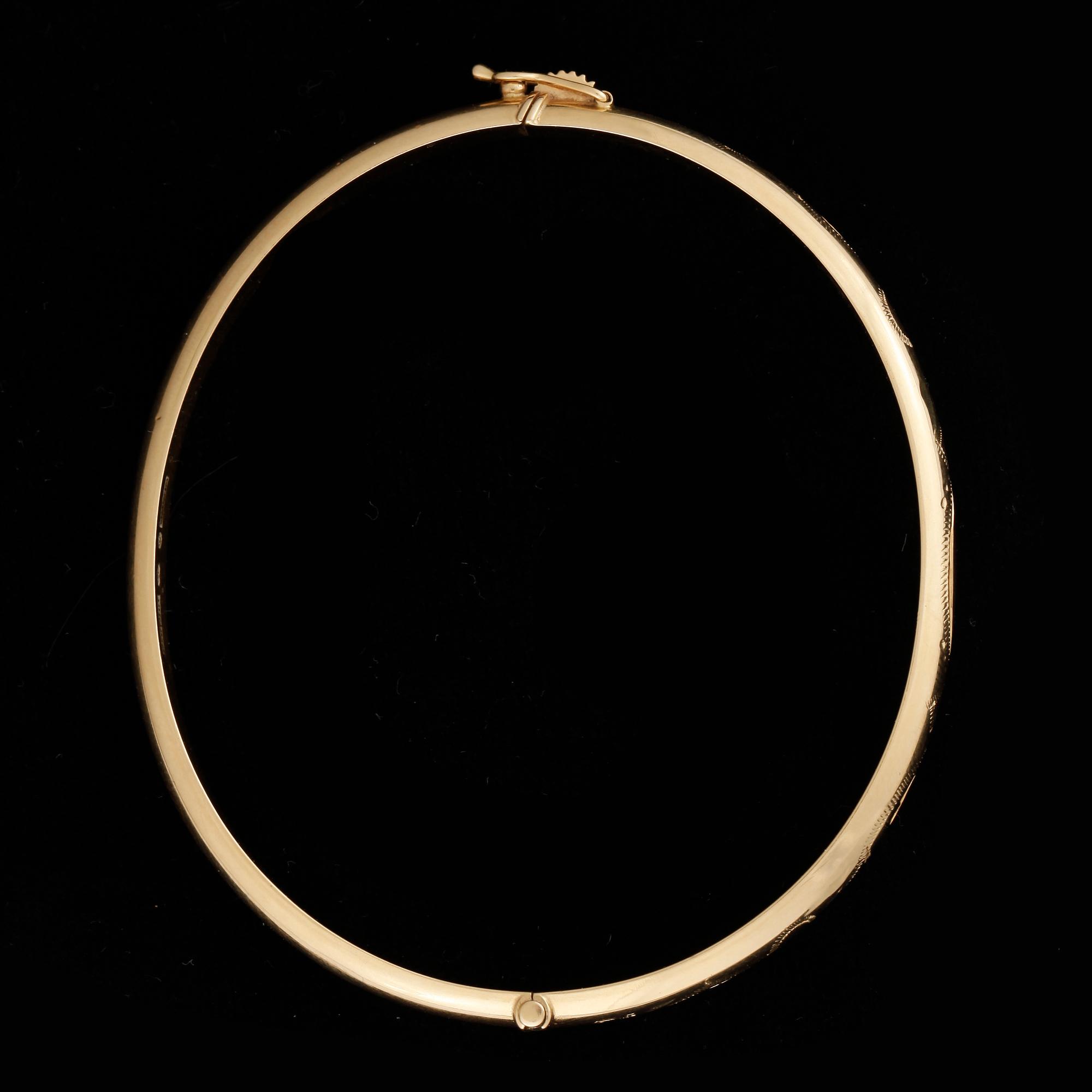ARMRING, 18k guld. Vikt 10g.