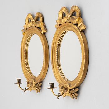 A pair of Gustavian style mirror sconces, beginning of the 20th century.