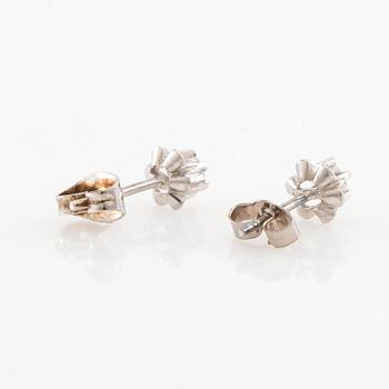 Earrings, a pair of 18K white gold set with round brilliant-cut diamonds.