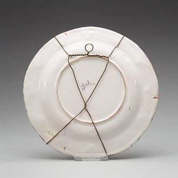 A Schleswig-Holstein faience dinner plate, 18th Century.
