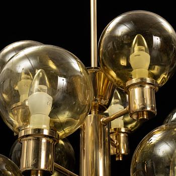 A 1960's brass and glass ceiling light.