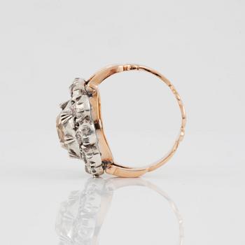 A brown and white rose-cut diamond ring.
