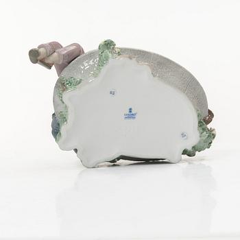 Lladró, three figurines,"Girl with French bulldog", "Girl with Dalmatians" and "Petals in the pond", Spain.