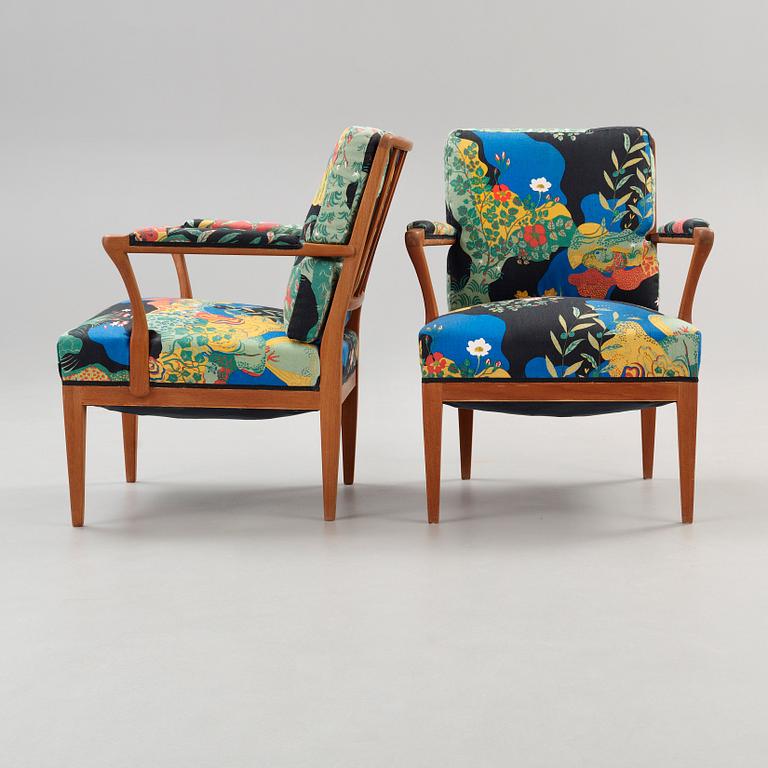 A pair of Josef Frank mahogany armchairs, Svenskt Tenn, model 868.
