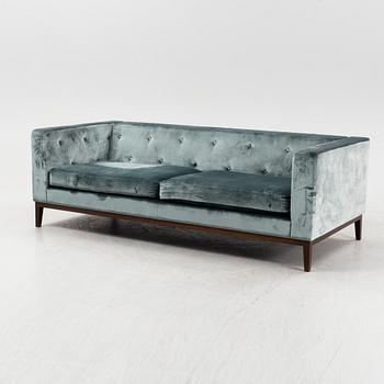 A contemporary velvet sofa, Jio Möbler.