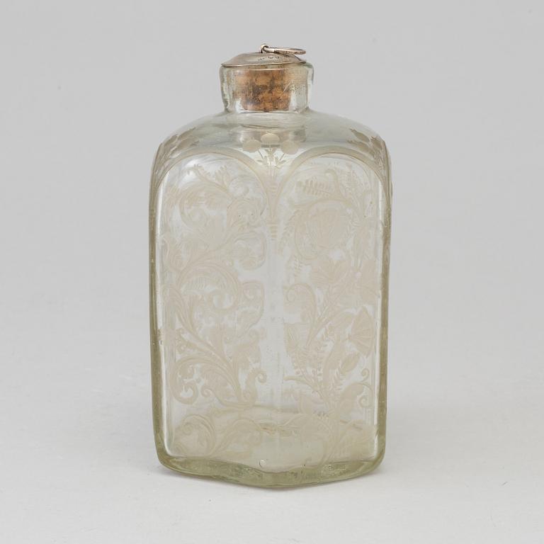 A baroque glass bottle, first half of the 18th century.