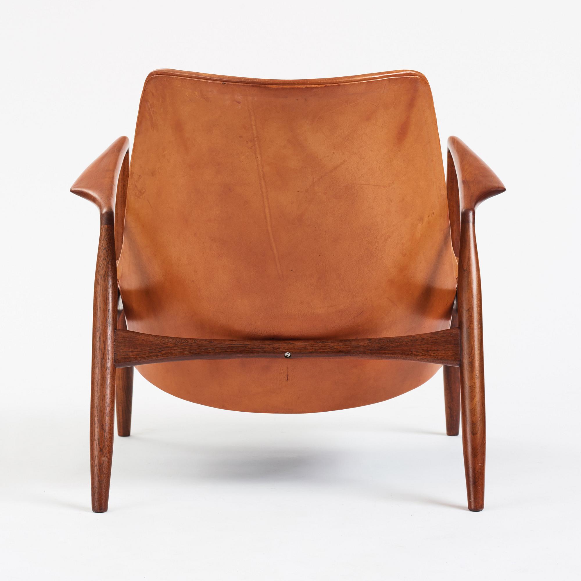 Ib Kofod-Larsen, a teak and cognac coloured leather 'Sälen' easy chair, Olof Perssons Fåtöljindustri (OPE), Sweden, 1950-60s.