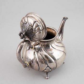 A Danish Rococo style silver teapot, P. Hertz, Copenhagen, Denmark, 1936.