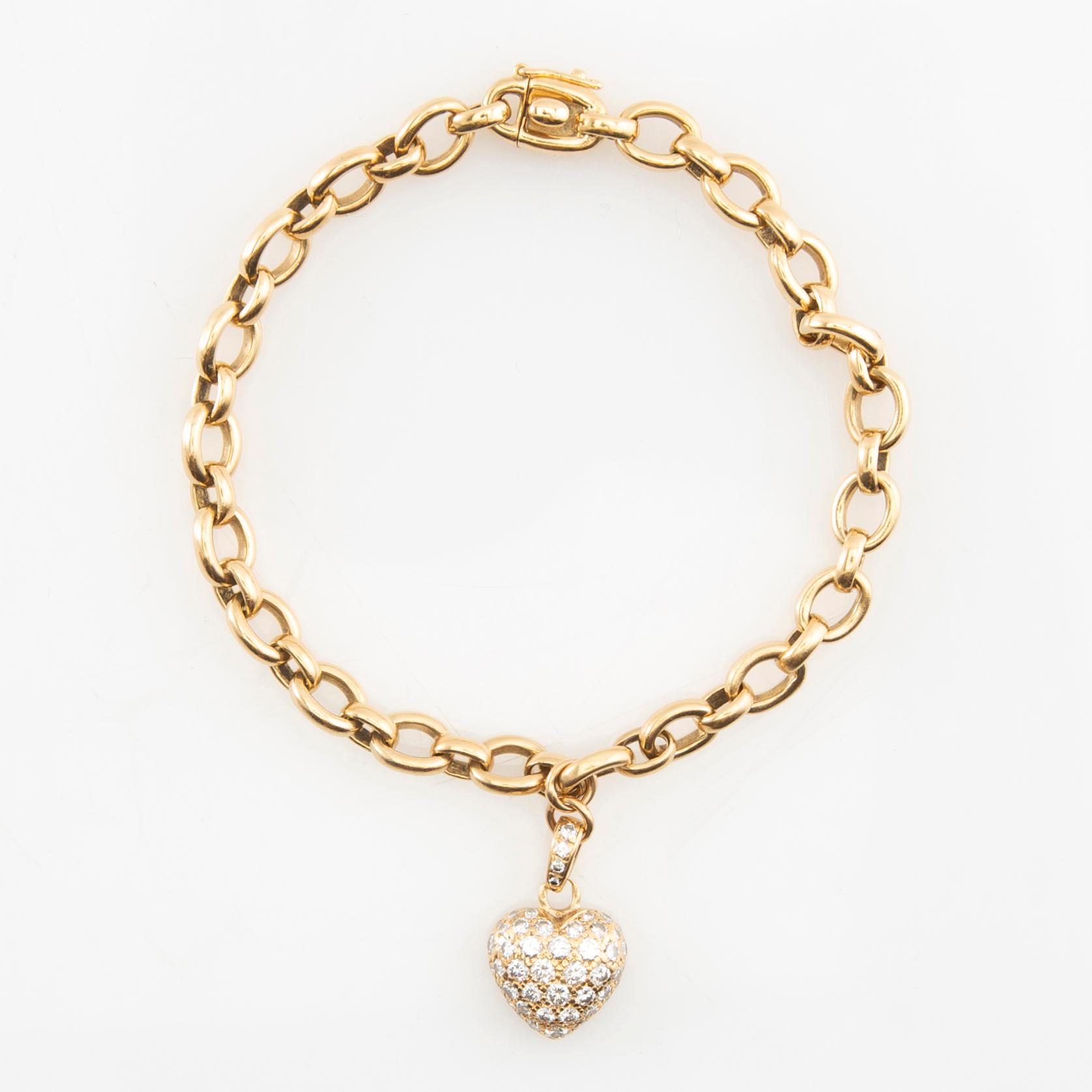 Cartier, Armband av 18K guld med runda briljantslipade diamanter.