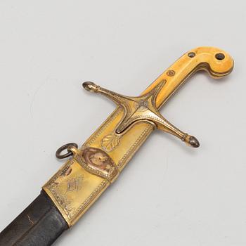 A Turkish Kilij sword, with scabbard, from around the year 1900.