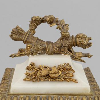 A circa 1900 Louis XVI-style mantle clock.