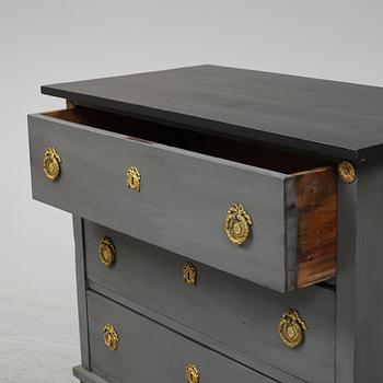 An early 20th Century painted Gustavian style chest of drawers.