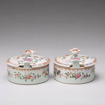 A pair of famille rose 'double peacock' condiment dishes, Qing dynasty, Qianlong (1736-95).