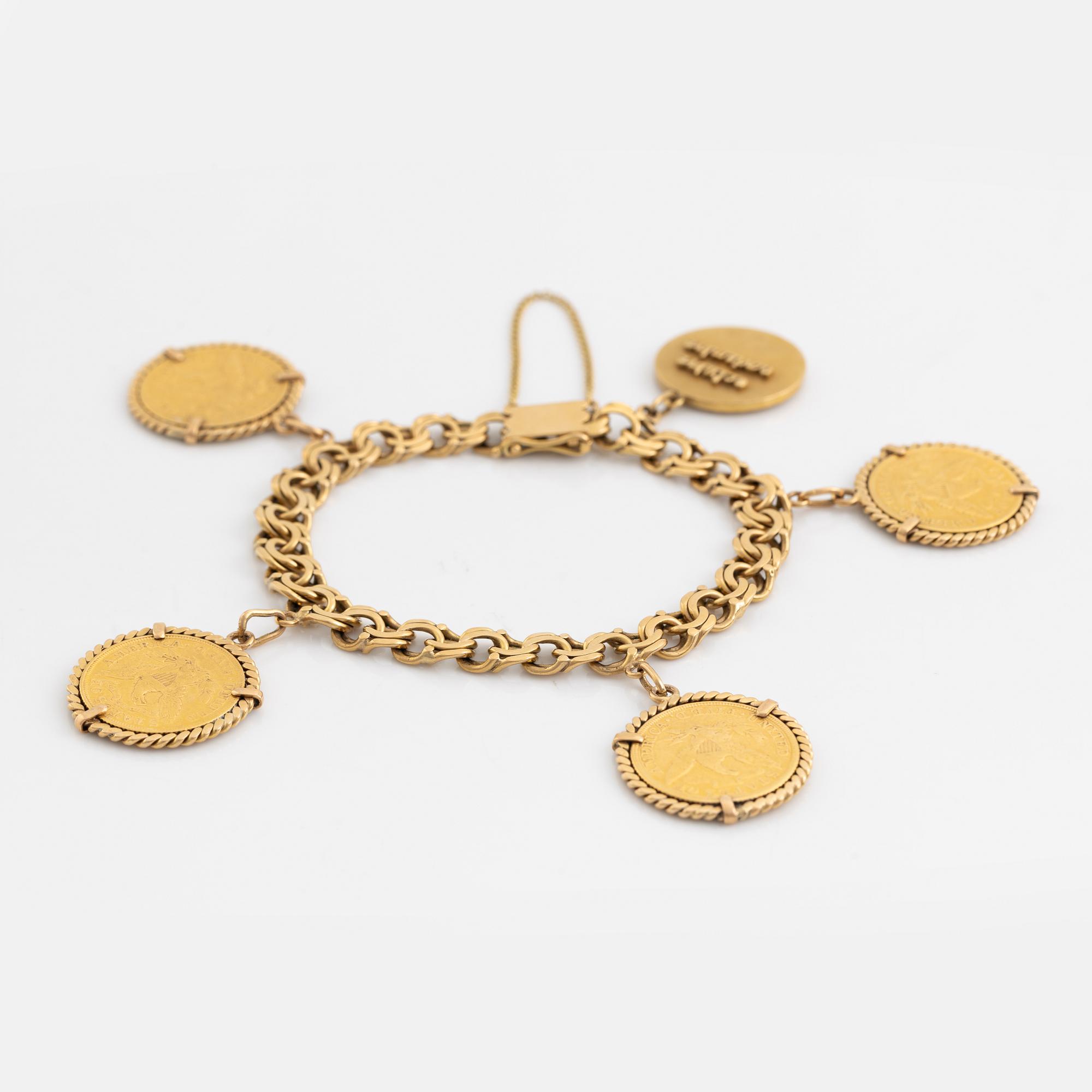 Armband guld bismarcklänk med berlocker med guldmynt.