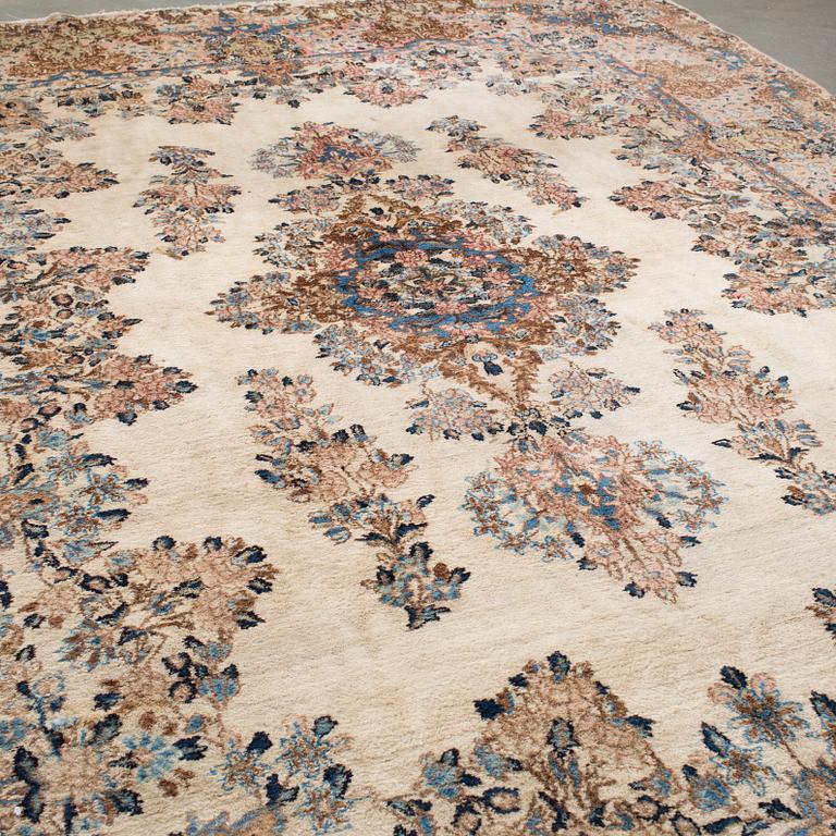 A Kerman carpet, around 360 x 262 cm.