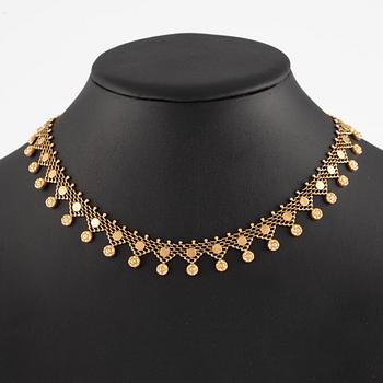 18K gold necklace.