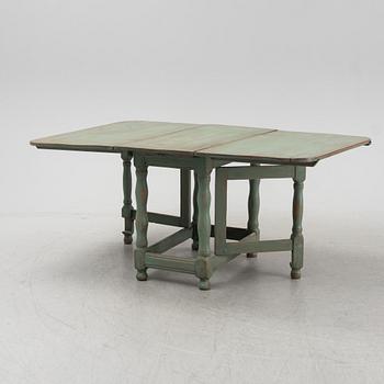 A painted pine gate-leg table, 19th Century.