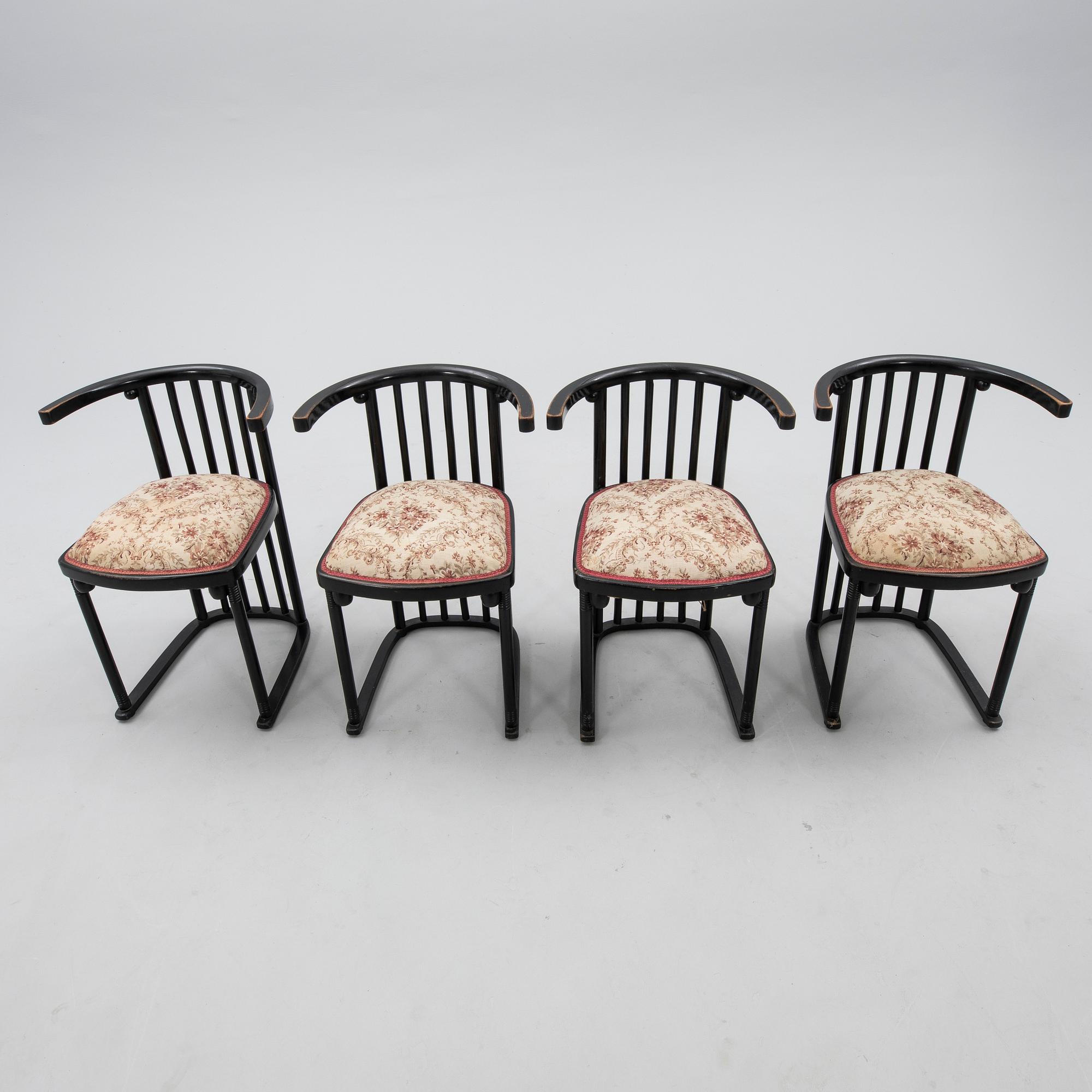 A set of four armchairs by Mundus, first half of the 20th century.