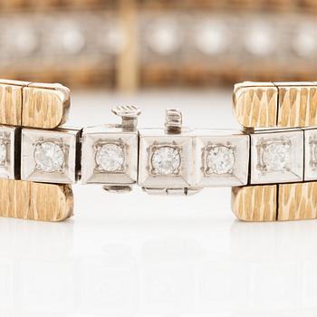 Bracelet in 14K gold and white gold with brilliant-cut diamonds.