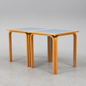 Table with four chairs, late 20th Century by Magnus Olesen.