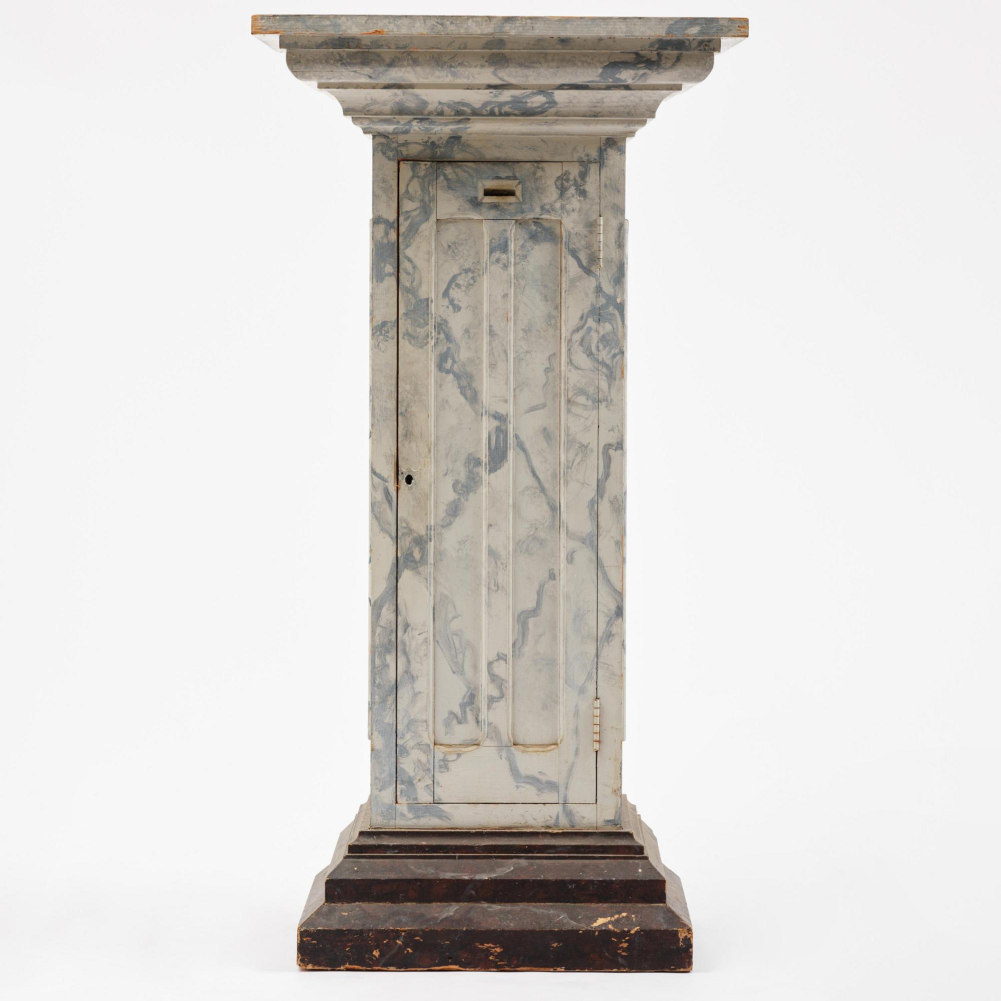 A Swedish column-shaped cabinet late 19 th century.