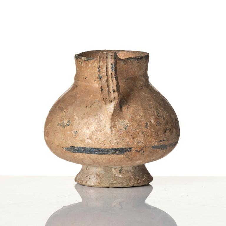 A central Asian pottery jug 12th-13th century.
