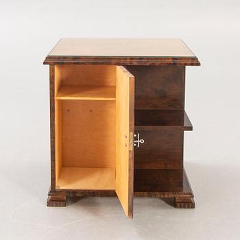 A 1930s birch side table.