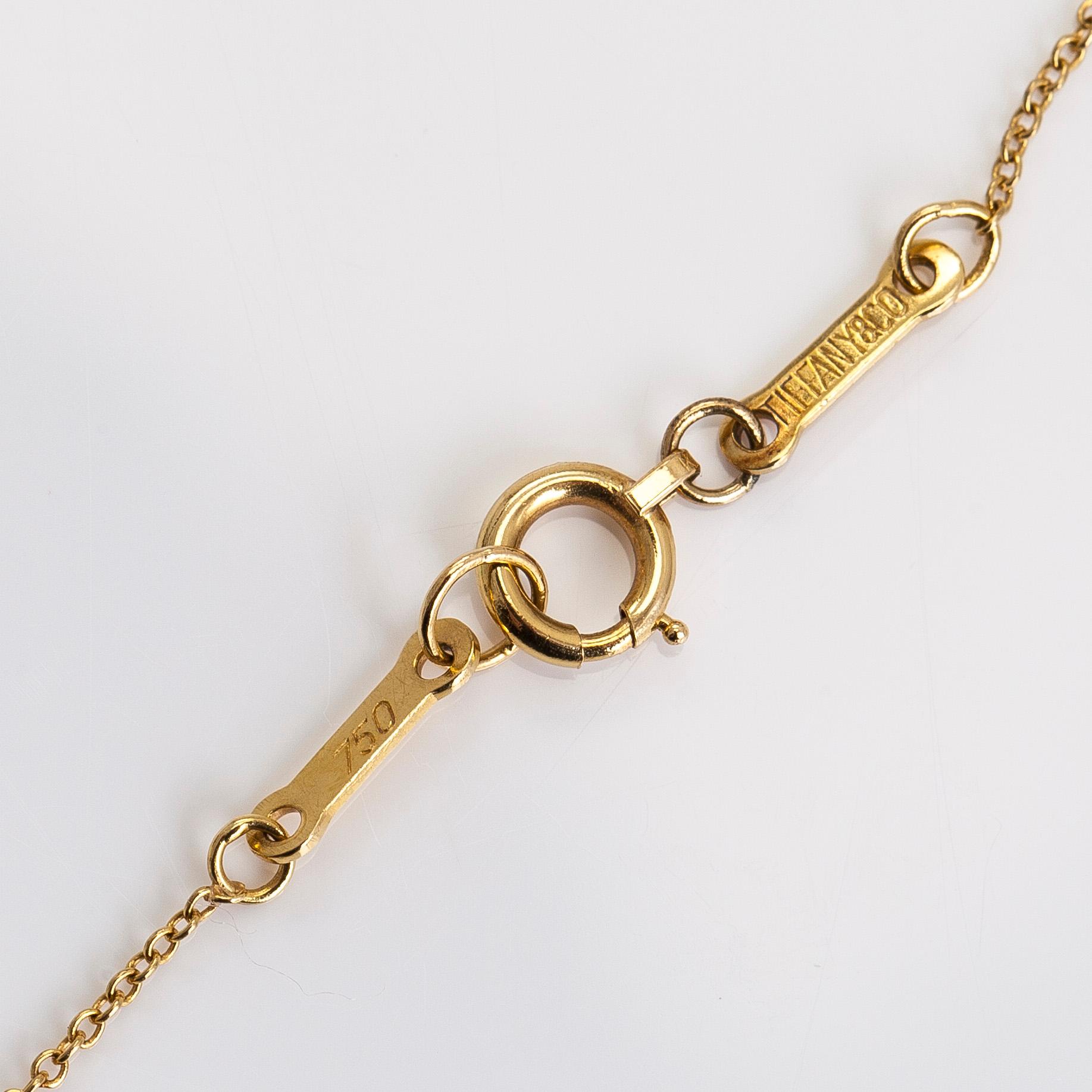 Tiffany & Co, Elsa Peretti, a 18K yellow gold 'Madonna' necklace.