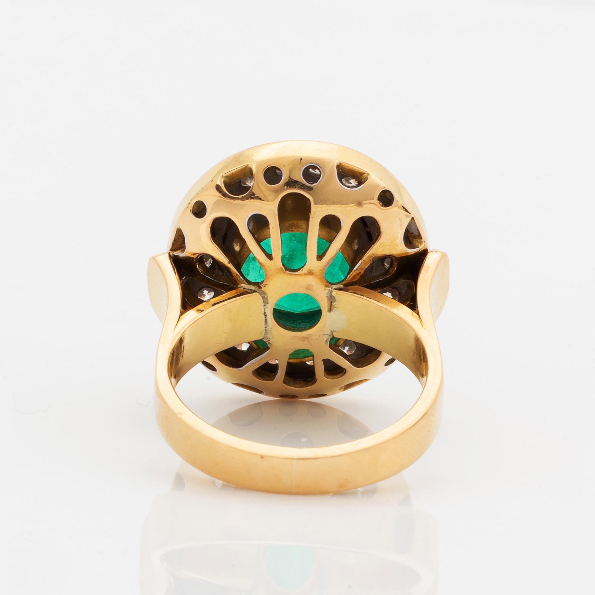 Emerald and brilliant-cut diamond ring.