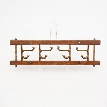 Klädhängare, ett par, "Dekorativ", Skoglunds metallgjuteri, Anderstorp, 1900-talets mitt.