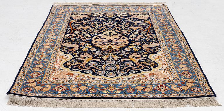 A semi-antique part silk Isfahan, signed, c. 176 x 107 cm.