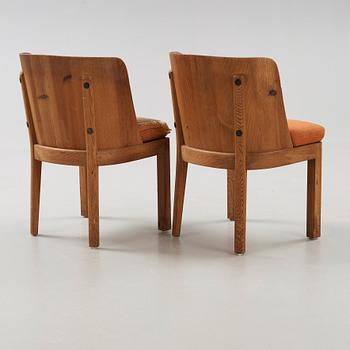 Axel Einar Hjorth, A pair of  'Lovö' stained pine armchairs, Nordiska Kompaniet, NK, 1930's.