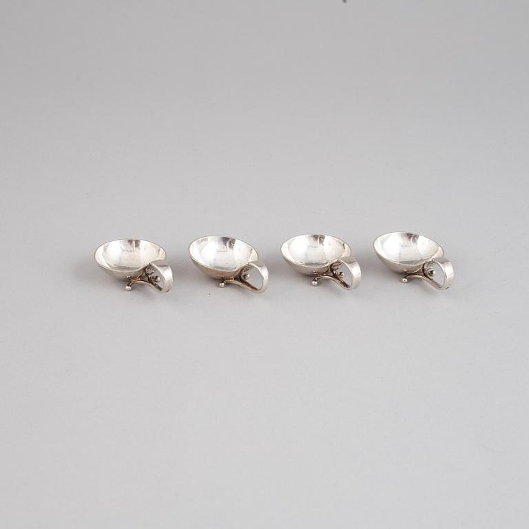 Four silver salt cellars from Georg Jensen.