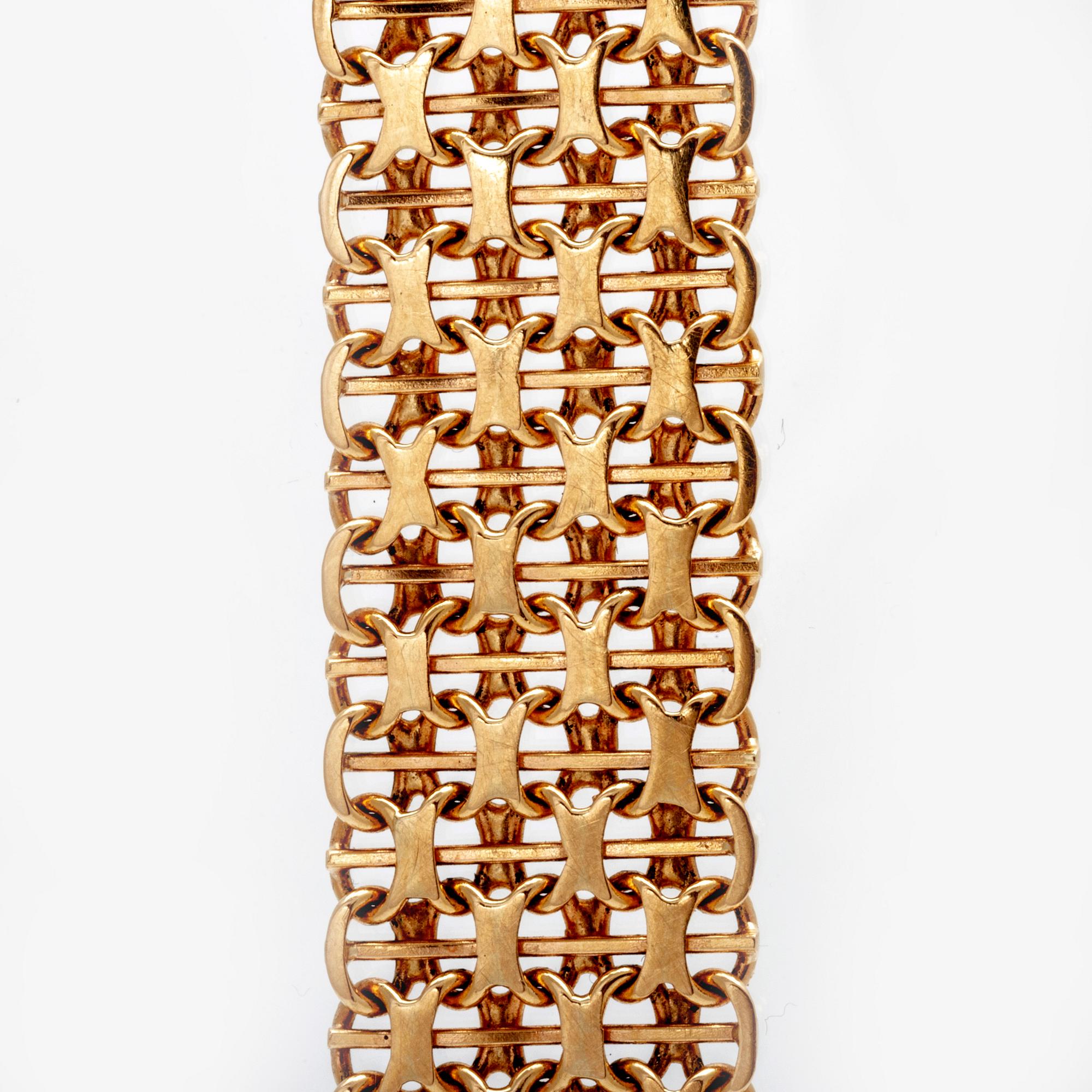 An 18K gold bracelet, 1975.