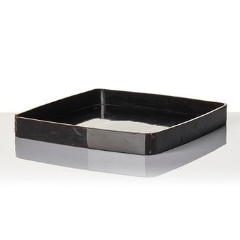 A Japanese lacquer tray and three Japanse wooden boxes.