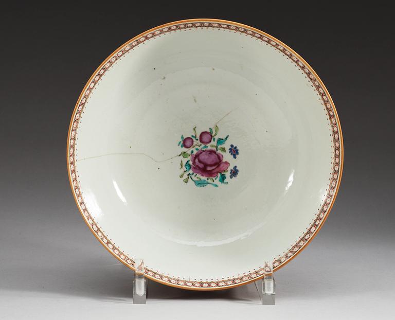 A famille rose armorial punch bowl, Qing dynasty, Qianlong (1736-95).