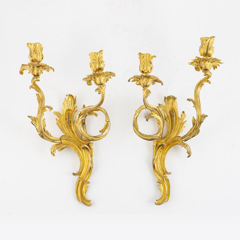A pair of French Louis XV style two-branch appliques, 19th century.