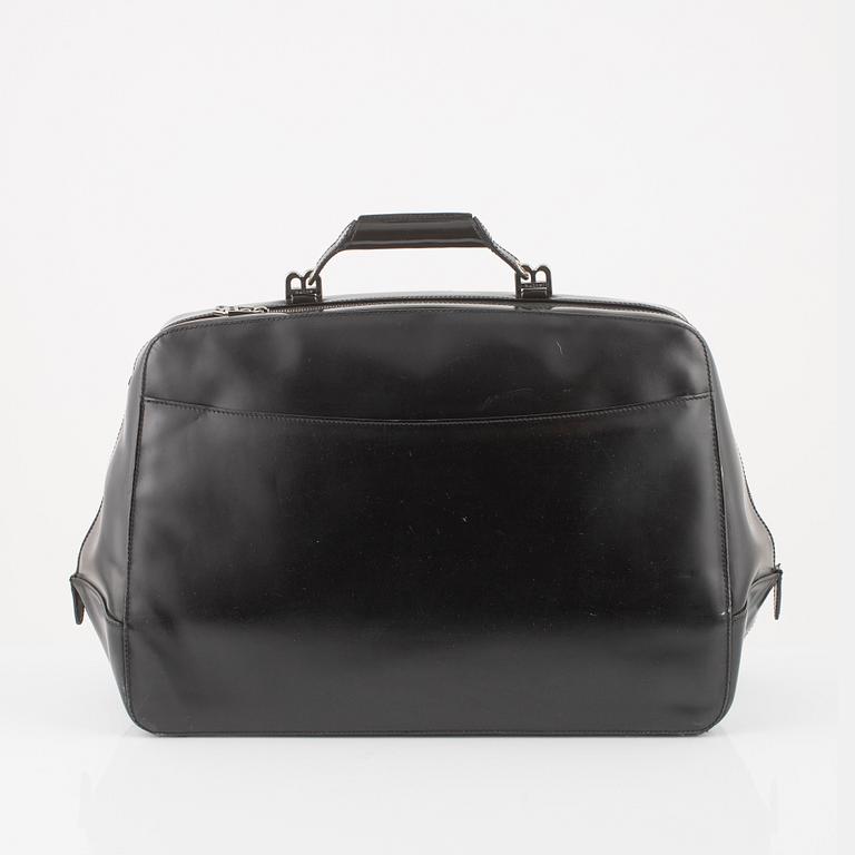 Bally, a black leather bag.