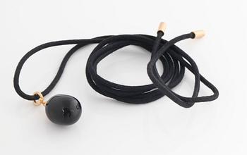 A onyx pendant by Ole Lynggaard.