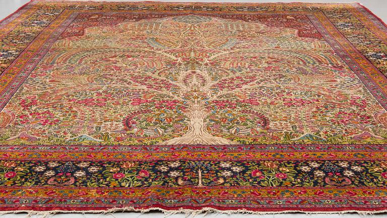 A CARPET, semi-antique Kerman, ca 360 x 284 cm.