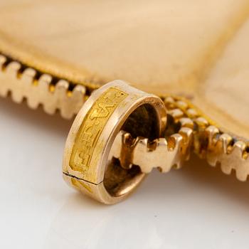 Heart locket, 18K gold with glass.