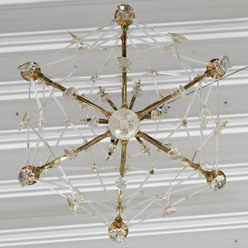 A seven-light gilt brass and cut glass rococo chandelier, mid 18th century.